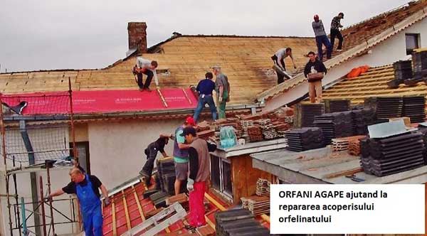 Some AGAPE orphans helping in fixing the orphanage roof